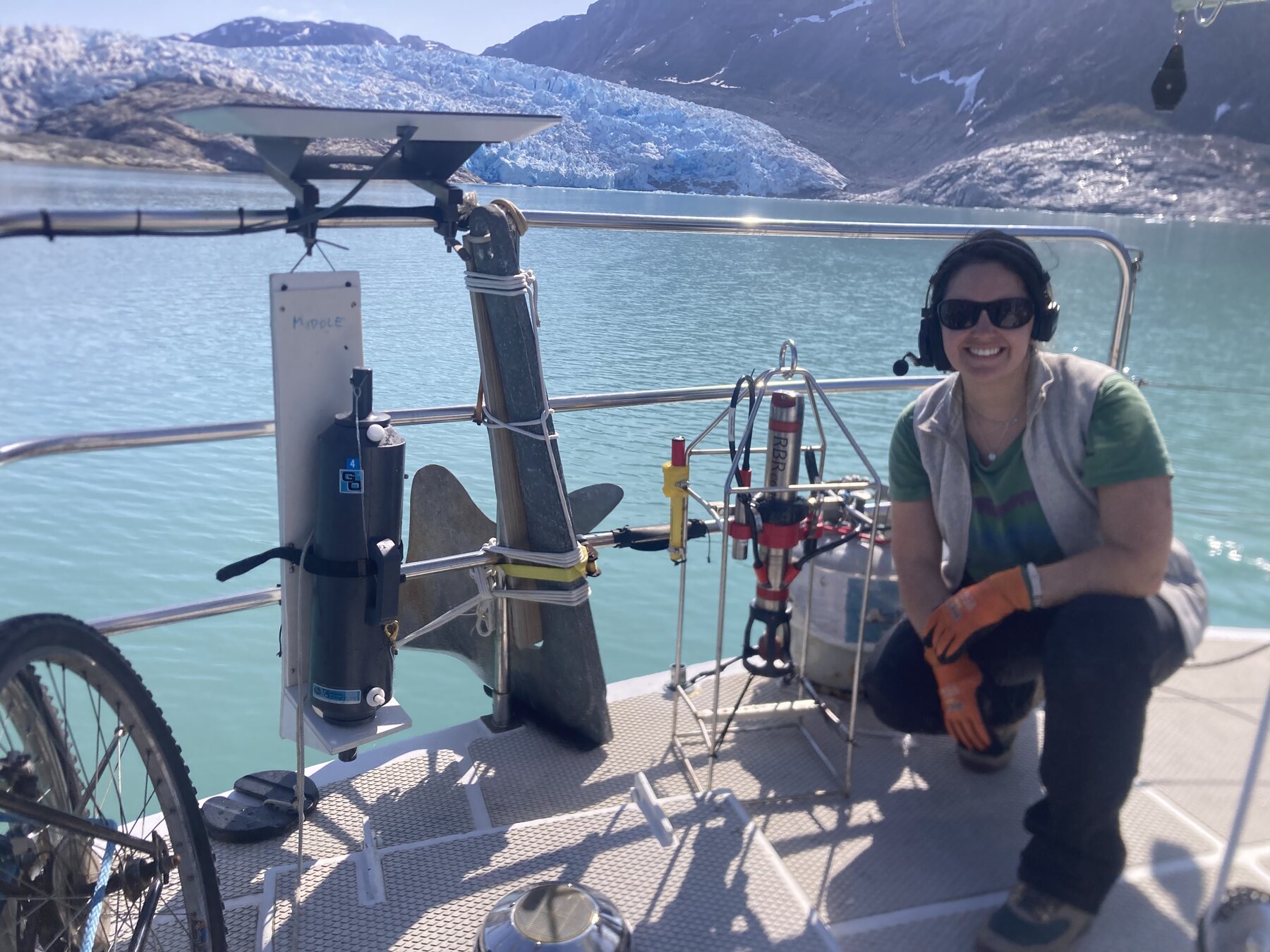 Jacquelyn Veatch with oceanographic instruments aboard the RV Marie Tharp in a southwest Greenland fjord